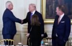 Trump and ceo of exxonmobil darren woods.jpg