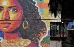 el salvadors mona lisa gets a colourful makeover in a 13metre mural made from recycled caps