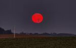 why the moon turns red during a total lunar eclipse
