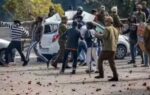 jammu protestors clash with police during a shutdown against the killing of 37