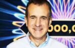 retired analyst claims top prize in who wants to be a millionaire quiz show