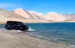 ladakh fines tourists for driving into lake