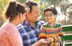 happy indian family at park