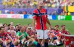 norways erling haaland leads teammates in a viking style boat row celebration