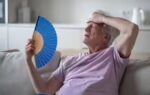 person struggling with heatwave