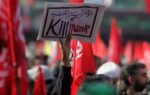posters from khameneis funeral
