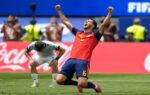 spain reaches world cup semifinals with 2 1 win over belgium in photos