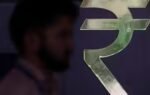 1787030566 rupee weakens against us dollar