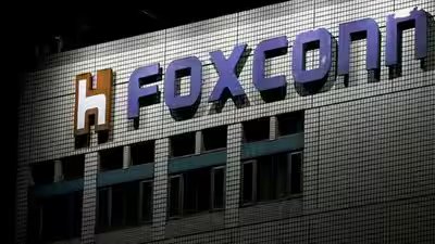 foxconn acquires 35173 million shares in india arm investing usd 372 million stake rises to 9999