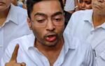 guards scuffle with police as officials remove billboard from abhishek bannerjees kolkata office