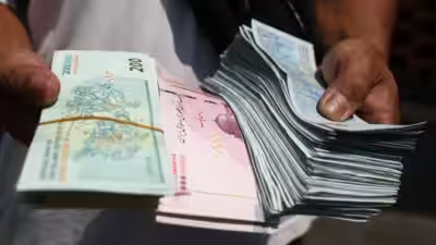 iranian currency sinks to record low as us works on new sanctions