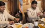 man teaches eating dosa with fork