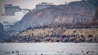 migrants cross into spains ceuta enclave from morocco in photos