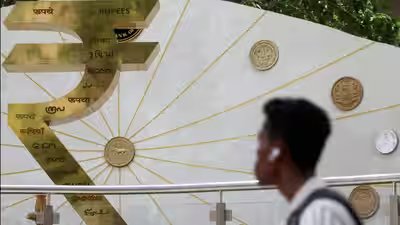 rupee rises 9 paise against us dollar