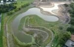 the golf course was used to increase the areas ability to hold stormwater