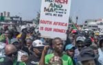 a protest by march and march an anti immigration movement