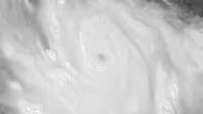 a satellite image shows hurricane polo intensifying near the coast of southwestern