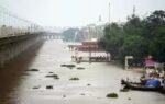 a view of riverside ghats submerged amid the rise in ganga