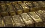 gold prices tumble as crude surge stronger dollar fuel rate cut worries