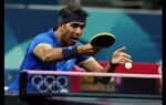 indias sharath kamal achanta plays against chinas fan zhendong during a mens