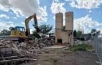 the twin chimneys were saved until the end of the demolition