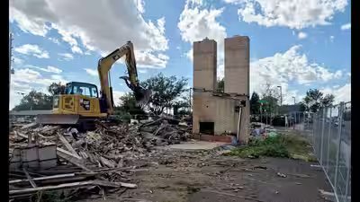 the twin chimneys were saved until the end of the demolition