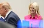white house aide natalie harp right looks after president donald trump left ap photo