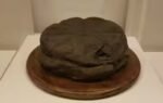 a 2000 year old preserved loaf of bread from herculaneum