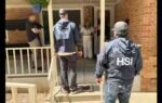 homeland security officials making an arrest in kansas city