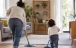 parent and child cleaning together