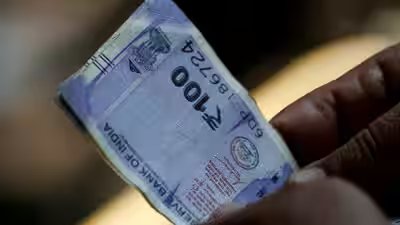 rupee slips 4 paise to 9639 against us dollar