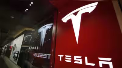 tesla cuts 2026 capex by one fifth