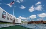 the memorials 184 foot structure stretches across the sunken uss arizona