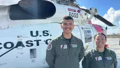 us coast guard officer josh law left and lieutenant miyako miller right